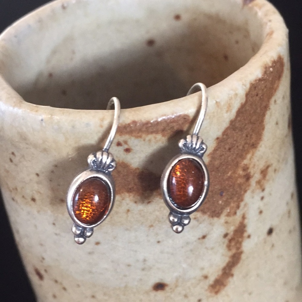 Sterling silver earrings with amber colored stones